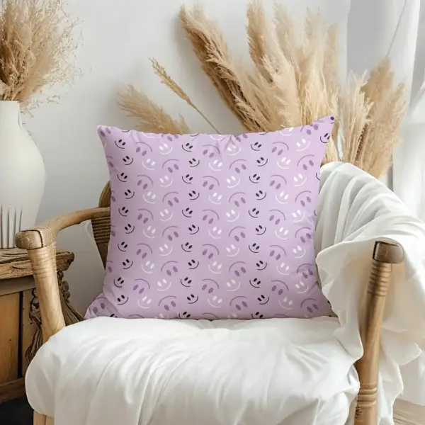 Pillow on bamboo couch with purple smiles