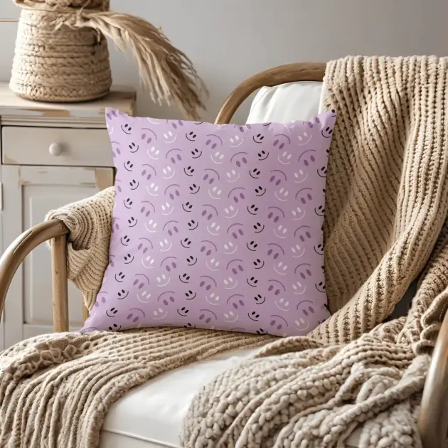 Pillow on bamboo couch with purple smiles