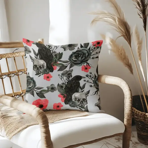 Pillow on bamboo couch with skull and flowers