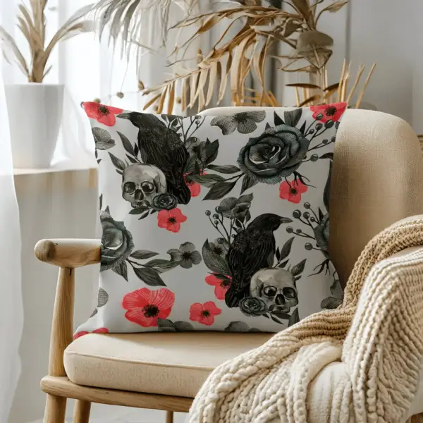 Pillow on bamboo couch with skull and flowers