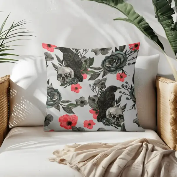 Pillow on bamboo couch with skull and flowers