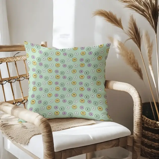 Pillow on bamboo couch with smiles